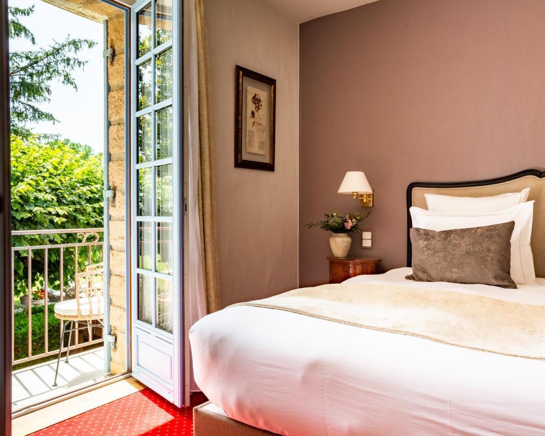 Hotel Restaurant Le Centenaire Les Eyzies Eksteriør bilde
